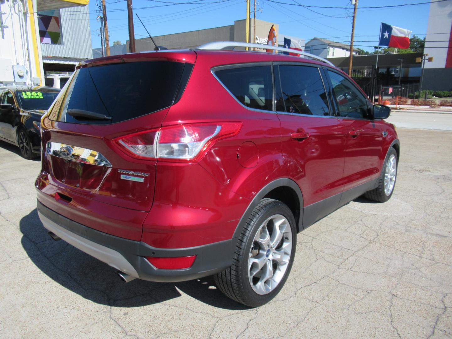 2014 Red /Black Ford Escape Titanium (1FMCU0J98EU) with an 2.0 engine, Automatic transmission, located at 1511 North Shepherd Dr., Houston, TX, 77008, (281) 657-1221, 29.798361, -95.412560 - 2014 FORD ESCAPE TITANIUM VIN: 1FMCU0J98EUA29272 1 F M C U 0 J 9 8 E U A 2 9 2 7 2 4 DOOR WAGON/SPORT UTILITY 2.0L I4 F DOHC 16V GASOLINE FRONT WHEEL DRIVE - Photo#16